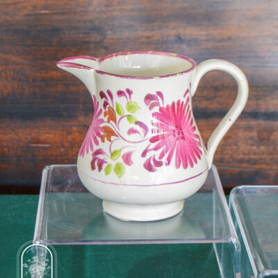 Copper lustre jug with pink florals