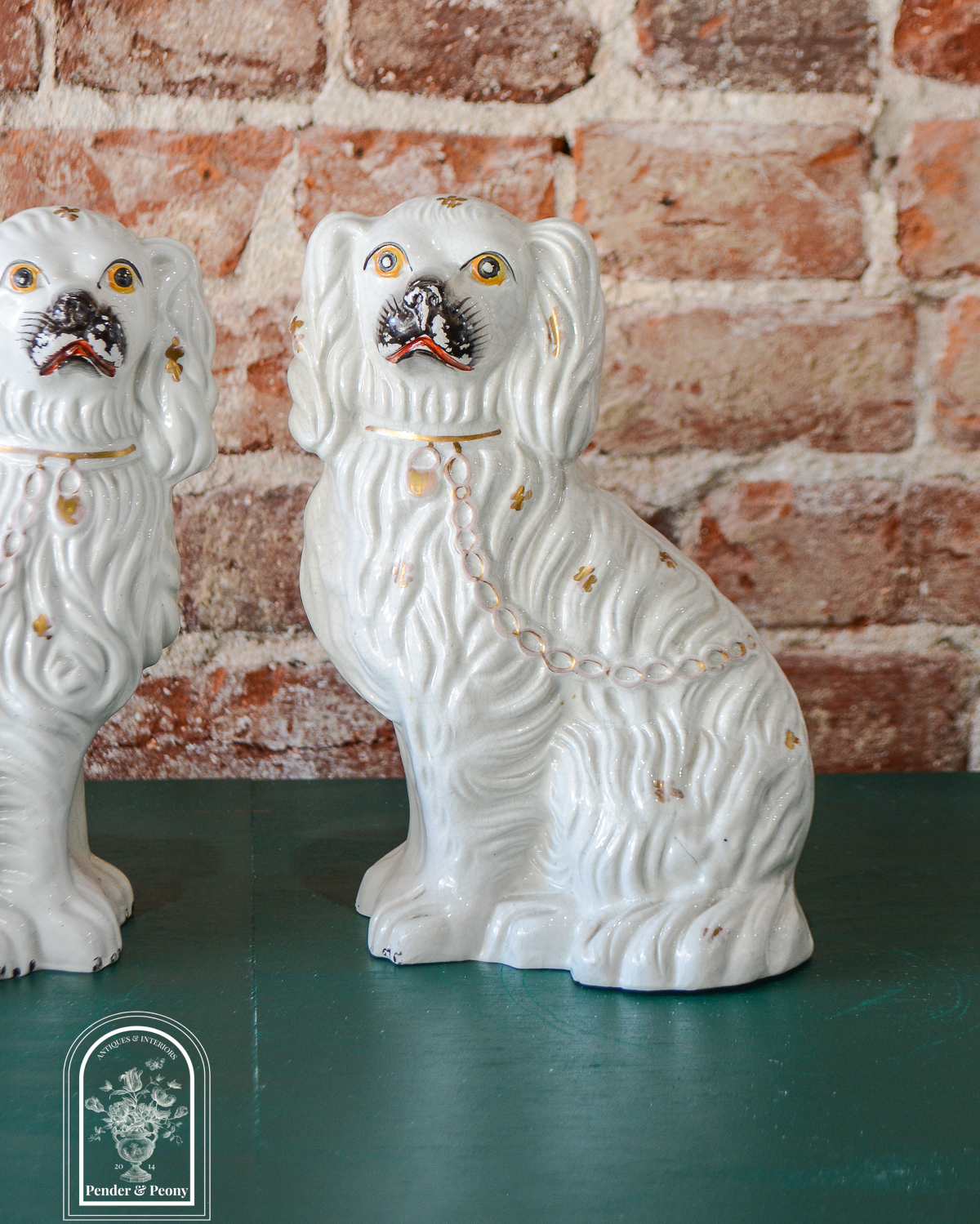 Darling pair of Staffordshire Spaniels in smaller size with gilt detailing