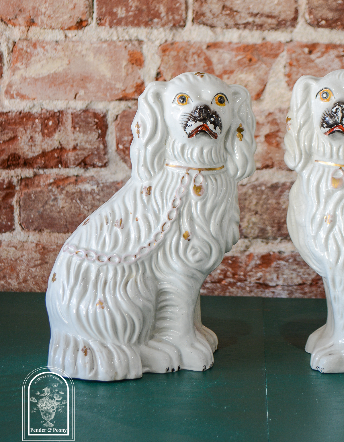 Darling pair of Staffordshire Spaniels in smaller size with gilt detailing