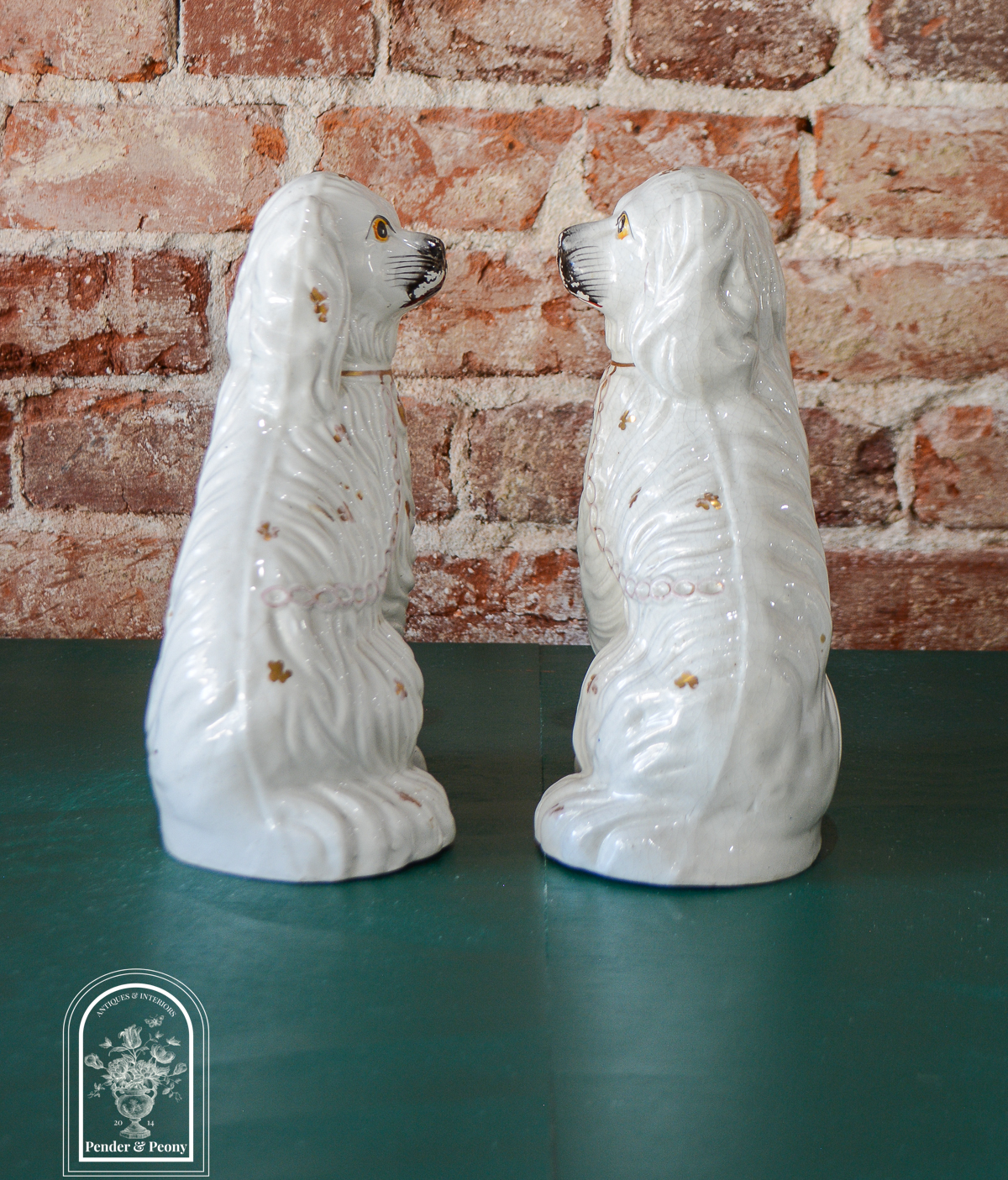 Darling pair of Staffordshire Spaniels in smaller size with gilt detailing