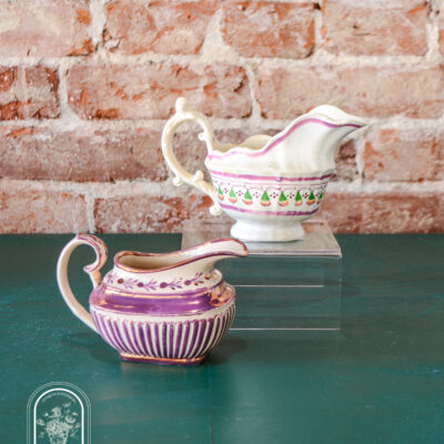 Pink copper luster with wide band and vertical stripes.