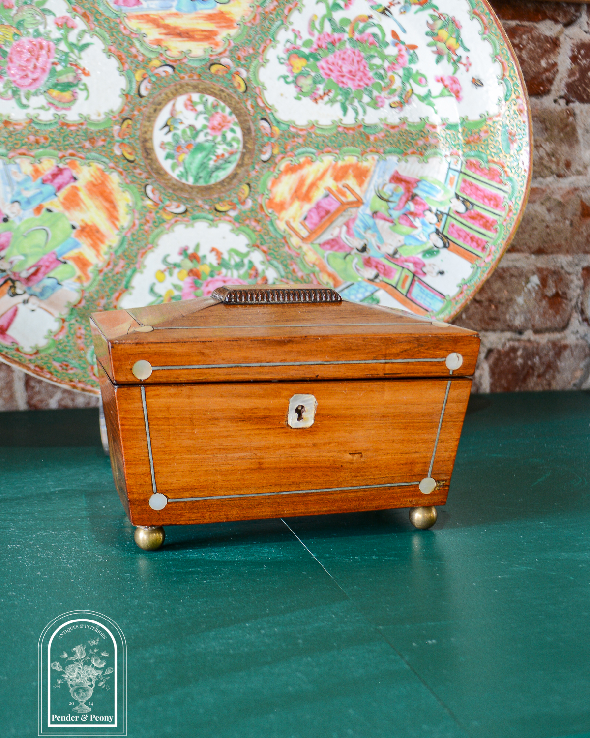 English Regency sarcophagus tea caddy with mother of pearl and pewter inlay