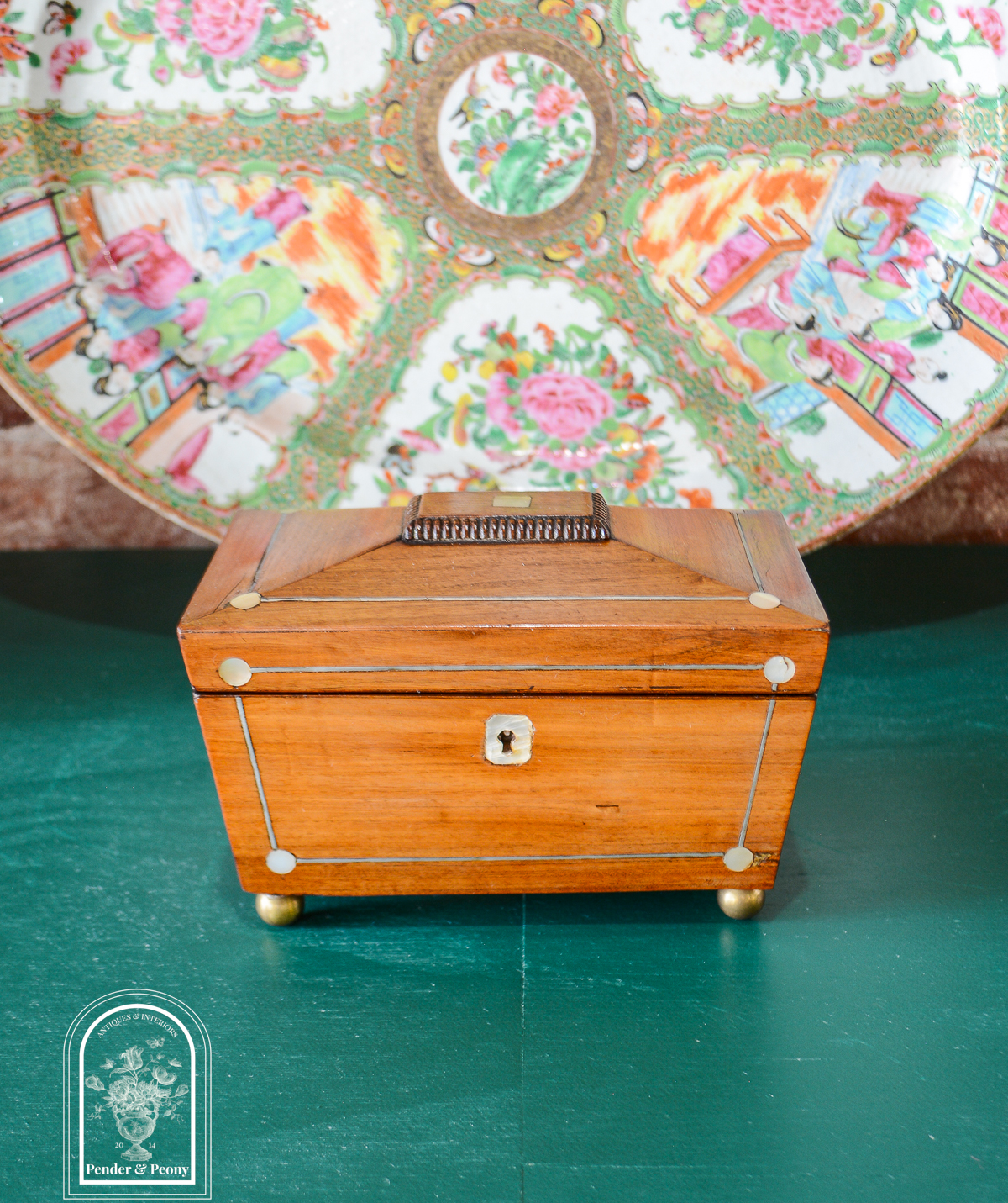 English Regency sarcophagus tea caddy with mother of pearl and pewter inlay