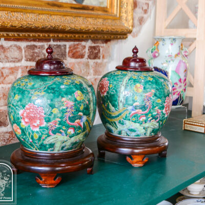 Pair of Famille Rose Phoenix Jars with emerald green ground and pink peonies