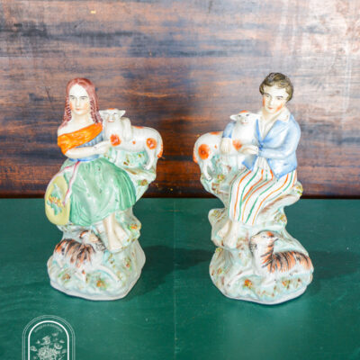 Staffordshire flatbacks of children with sheep and goats