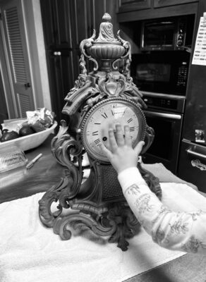 James helping clean a 19th c gilt ormolu clock