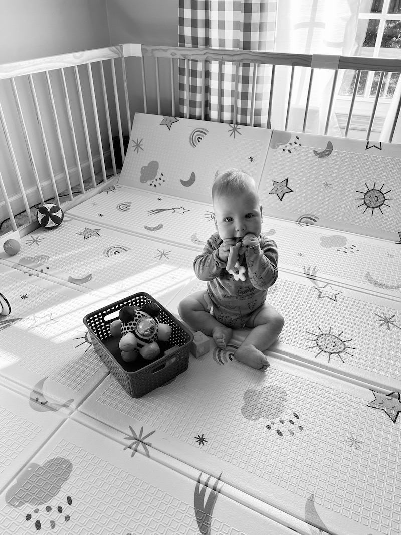 James playing in his playpen in the formal living room