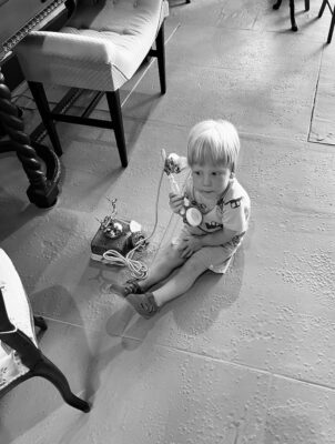 James on the vintage phone in the antique shop