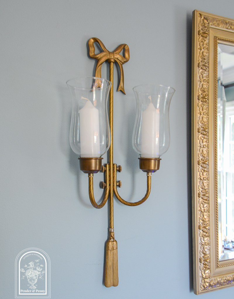 Pair of brass bow candle sconces