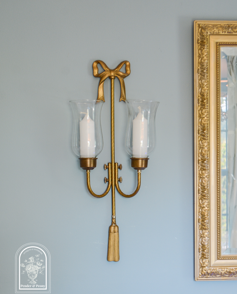 Pair of brass bow candle sconces