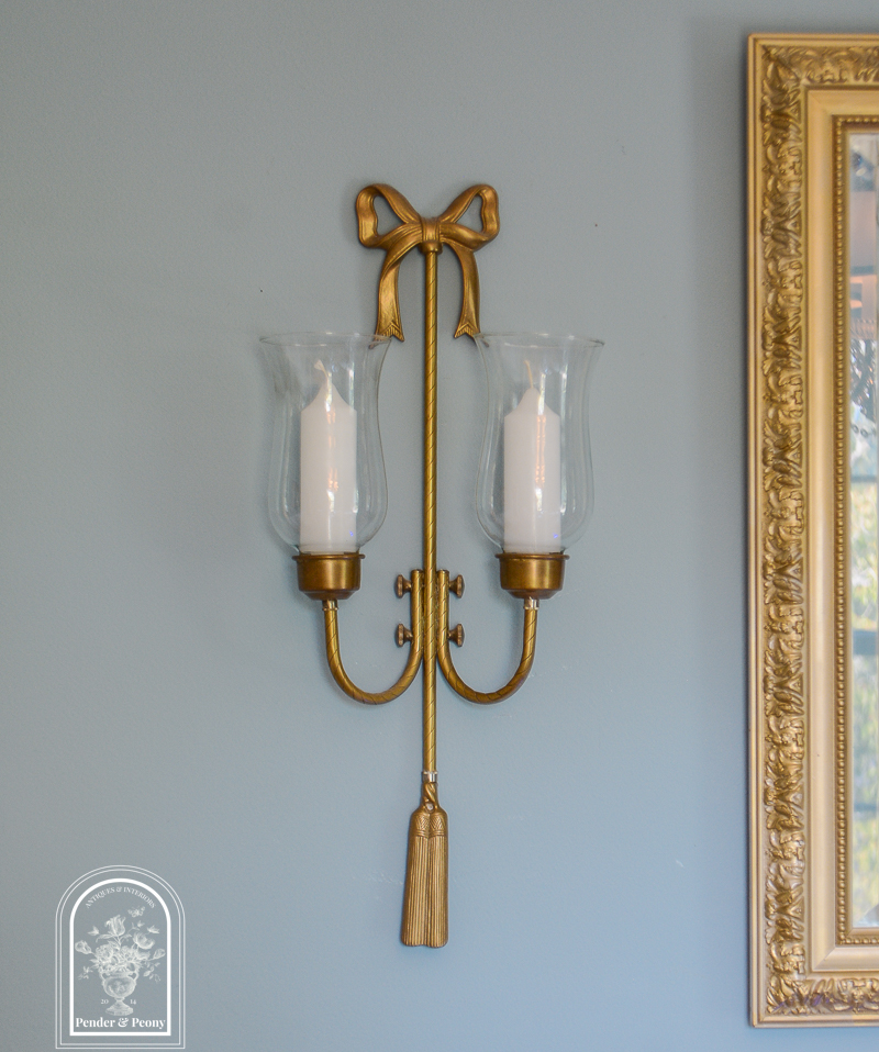 Pair of brass bow candle sconces