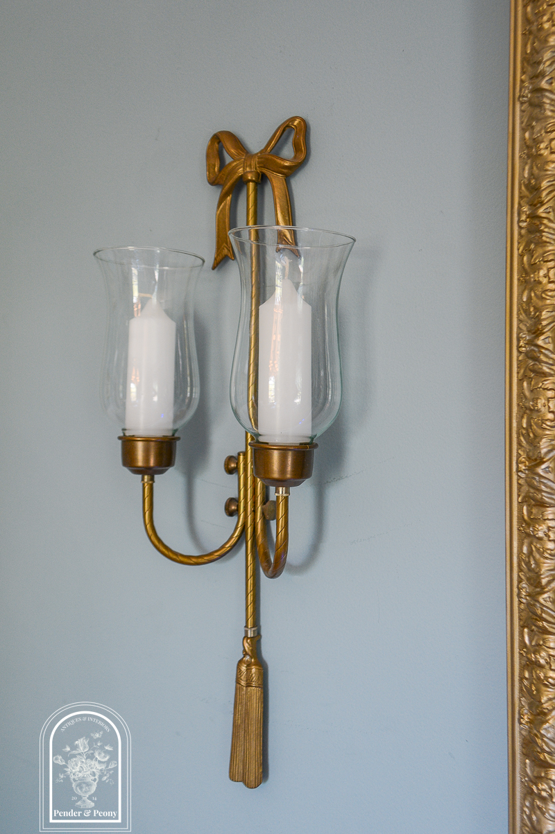 Pair of brass bow candle sconces