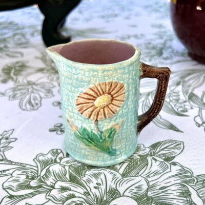 Small Majolica flower pitcher with pink and turquoise