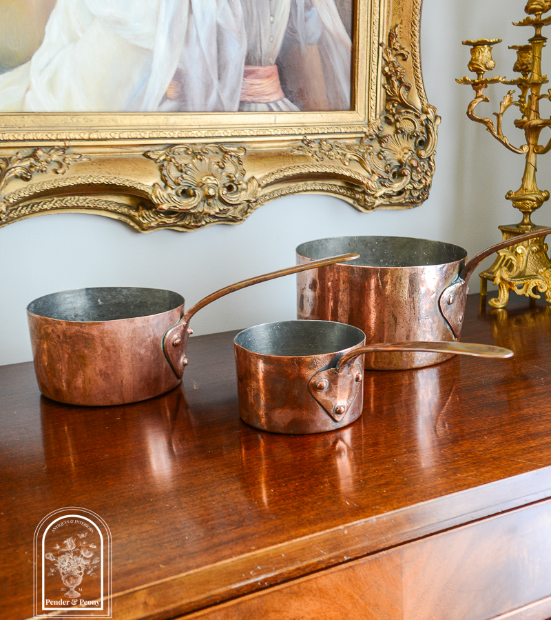 Early 1800s copper pots with copper handles, set of 3, available on penderandpeony.com