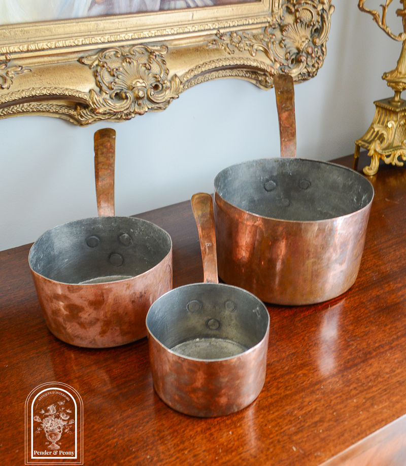 Early 1800s copper pots with copper handles, set of 3, available on penderandpeony.com