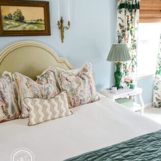 Striped silk headboard, Taplow Shams, Scrolling Fern accent pillow, ivory waffle duvet, green velvet quilt