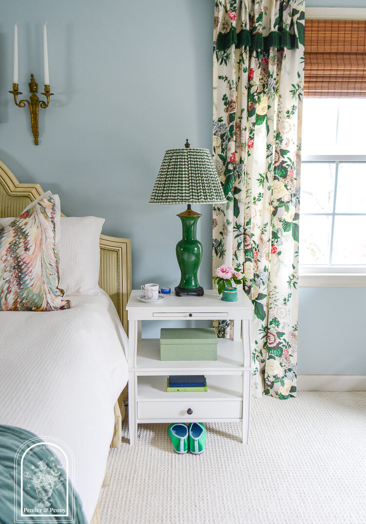 White step back nightstand with green Chinese lamp and gingham shade