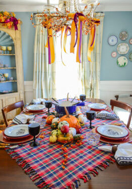 A vintage inspired fondue party with Swissmar set, antique Mottahedeh, plaid, pumpkins, and Murano glass