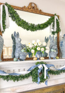 Boxwood and bunnies blue and white Easter mantel with Regency inspired decor