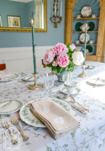Elegant spring table decor with Wedgwood Queen's Ware, peonies, silver, and floral linens