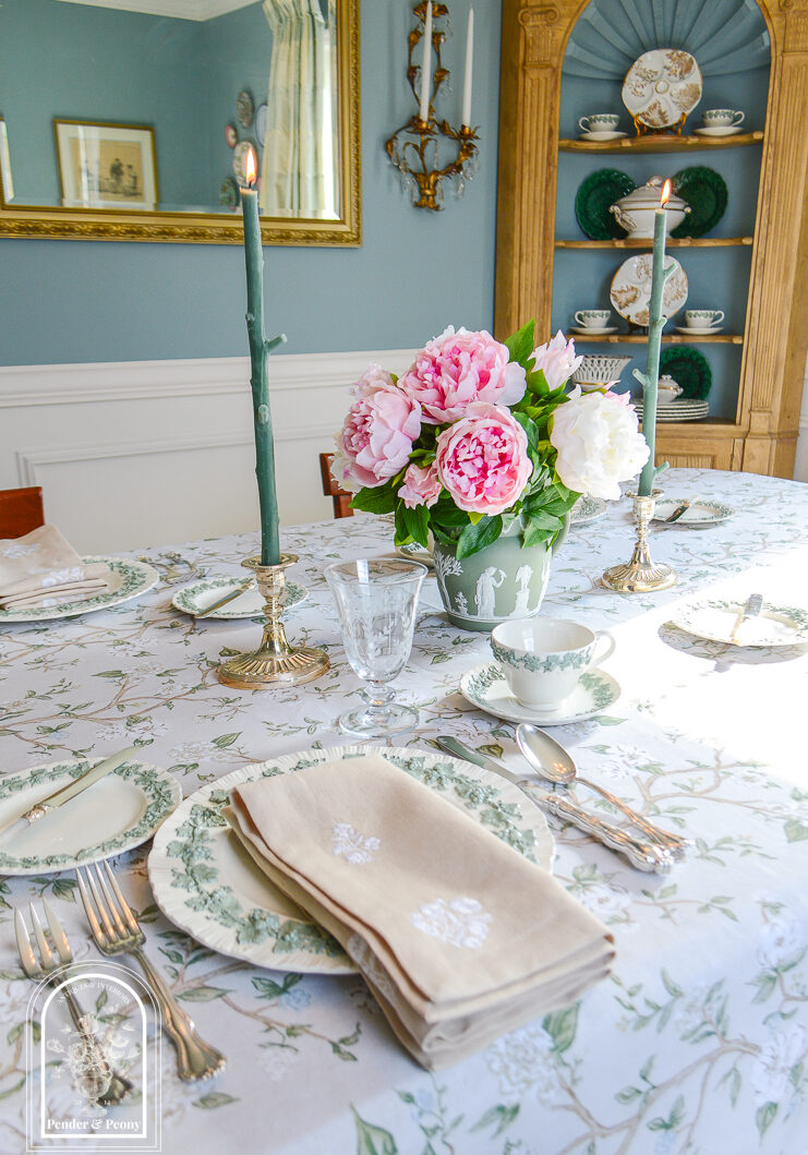 Elegant spring table decor with Wedgwood Queen's Ware, peonies, silver, and floral linens