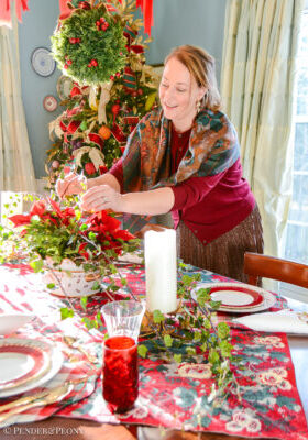 Making Christmas magic with classic Christmas table decor - setting the table in elegant red, green, and white with chintz, Johnson Bros, plaid, and Royal Worcester