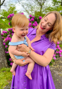 Katherine and James laughing. Some thoughts on motherhood