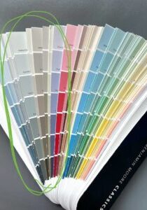 Benjamin Moore fan deck of classic colors with muddy interior paint colors circled