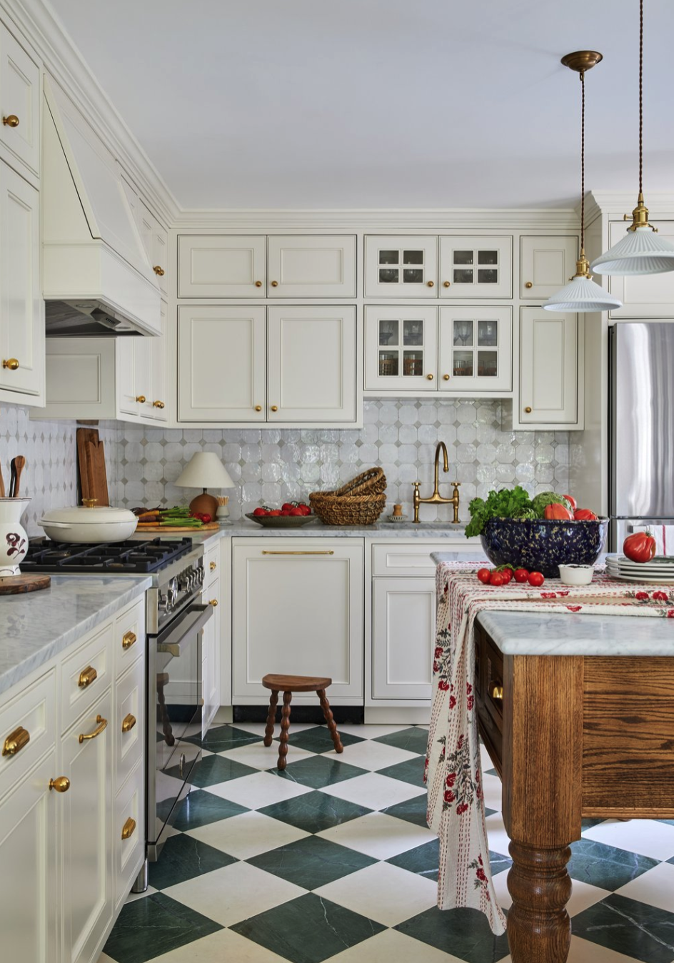 Stephanie Perez Design traditional kitchen in white and black with checkerboard floor