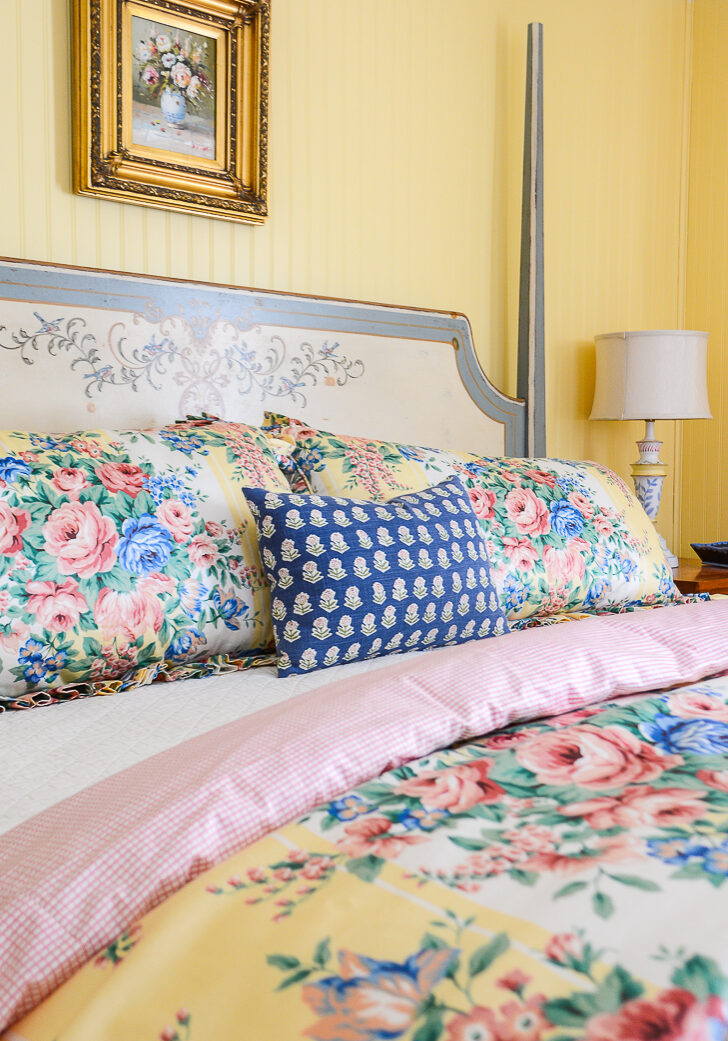 Decorating a guest bedroom - floral chintz bedding with block print pillow