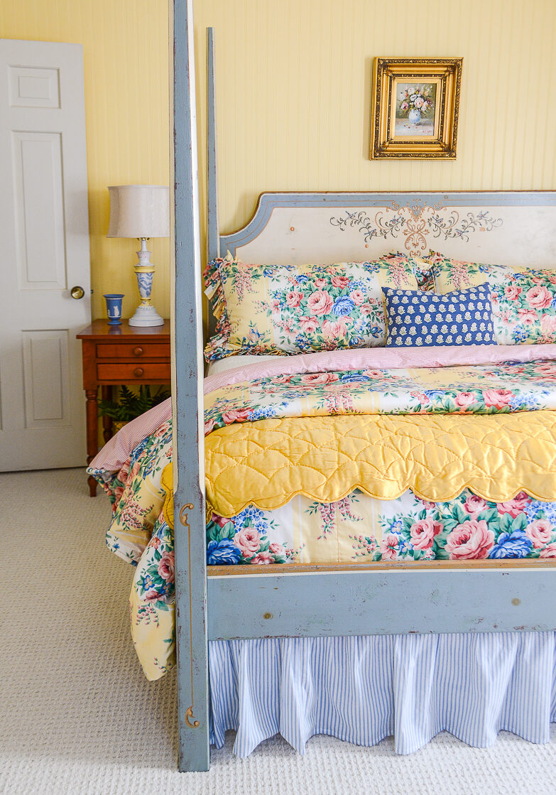 Our yellow and blue guest bedroom reveal that turned a sad boring room in to a happy yellow Grandmillennial retreat!