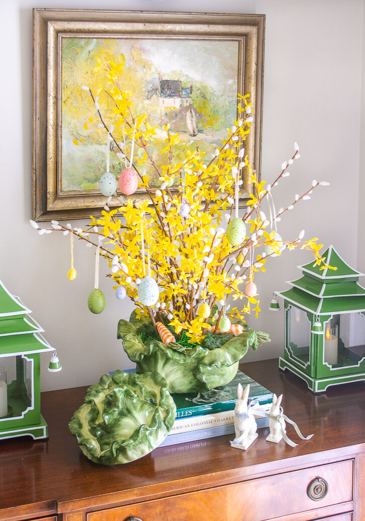Yellow bell Easter egg tree in cabbageware tureen with speckled egg ornaments